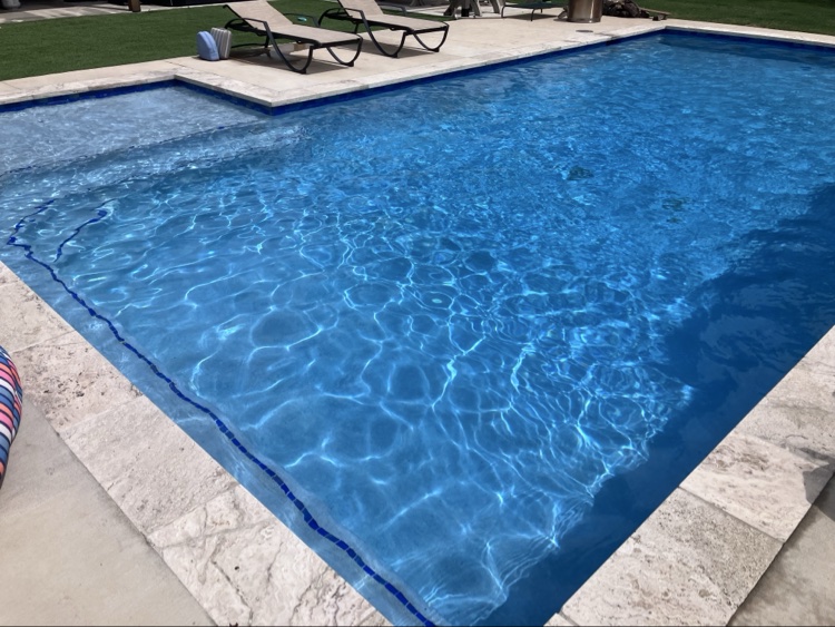 Geometric pool with loungers